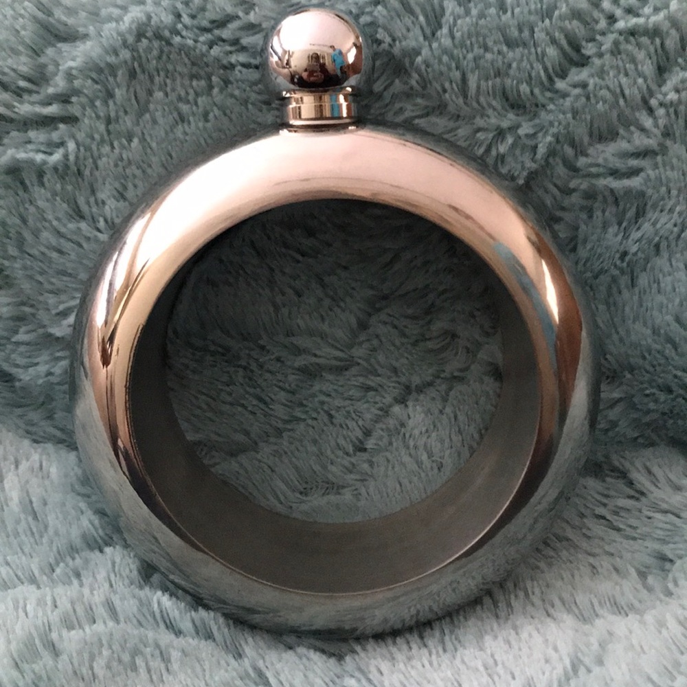 Silver tone cuff flask bracelet